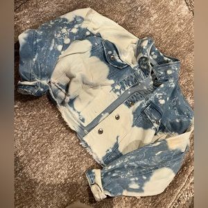 Bleached oversized denim jacket. It’s also cropped. Size medium
